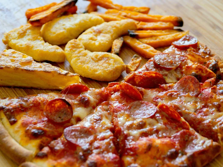 Photo by Brett Jordan: https://www.pexels.com/photo/pepperoni-pizza-and-sweet-potato-fries-5017806/